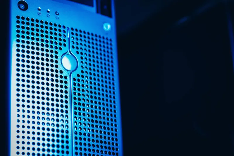 Modern server rack with blue lighting in a data center, representing cloud infrastructure behind AI video rendering