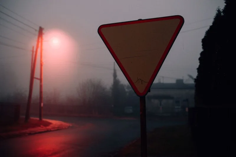 Foggy, moody street scene at night