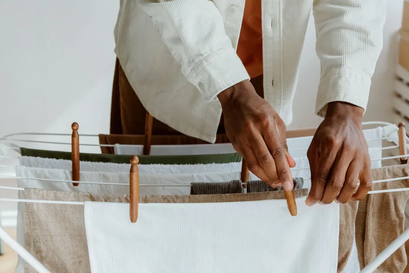 Close-up of hands organizing laundry, a satisfying-process visual