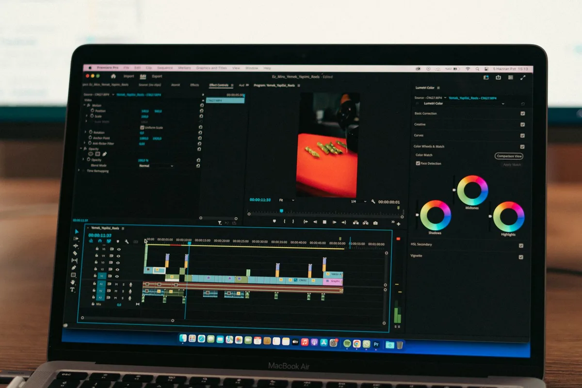 Descript video editor interface showing transcript editor with word-level editing and timeline