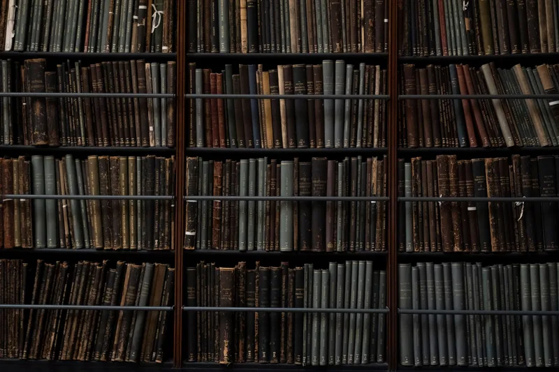 Vintage library books on shelves representing history and education YouTube channels