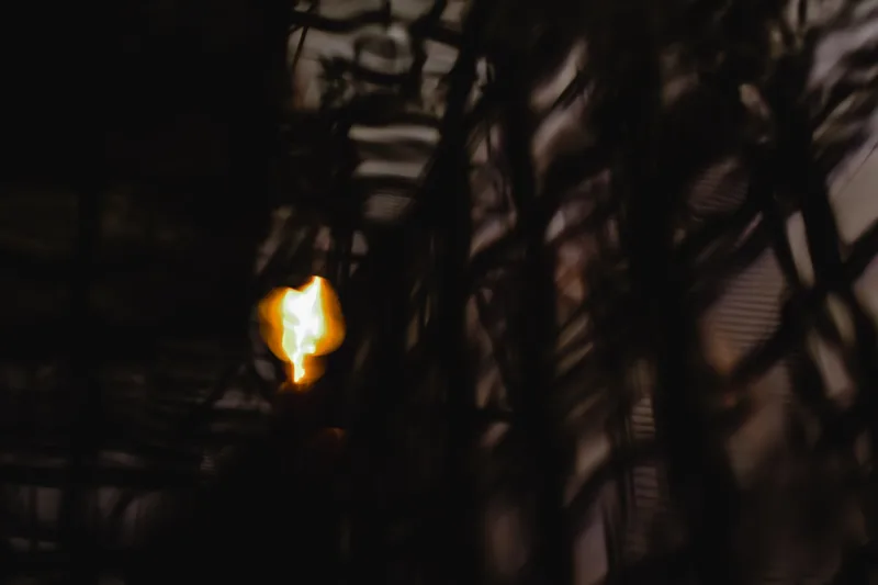 Dark atmospheric light pattern representing mystery and true crime YouTube channel aesthetic