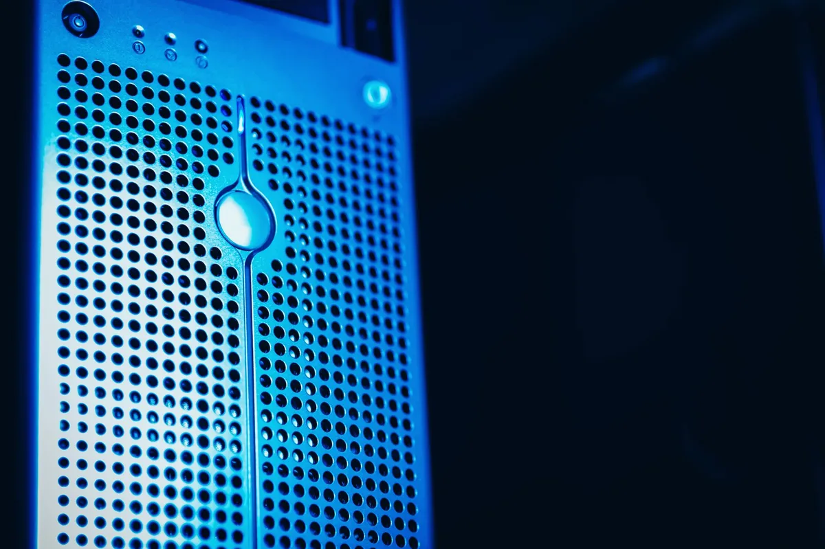 Blue-lit server hardware in a dark data center, representing AI video generation infrastructure