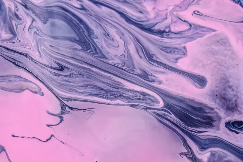 Swirling pink and purple fluid abstract art, representing AI-generated stylized motion effects