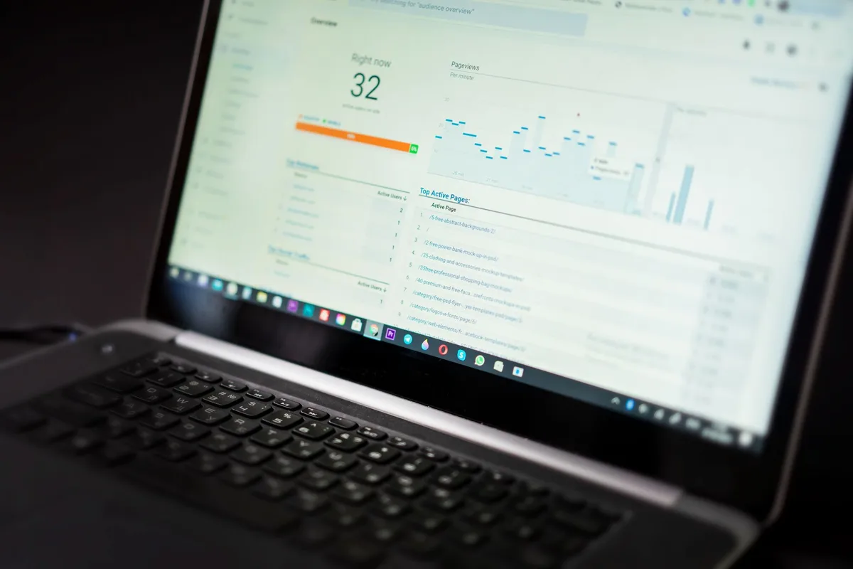Laptop showing an analytics dashboard used for YouTube channel management