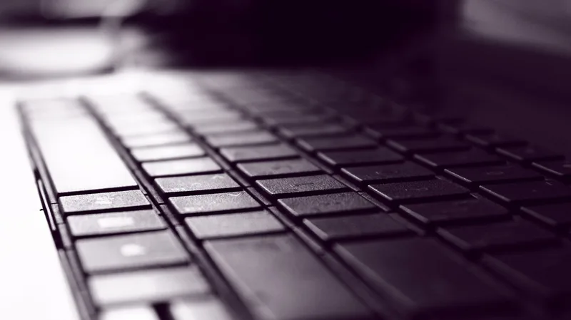 Close-up of a dark computer keyboard
